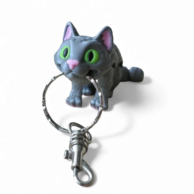 Кінематичний 3D брелок Кіт сірий з зеленими очима