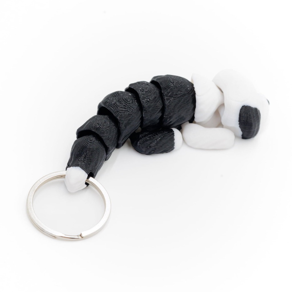 Кинематический 3D брелок Пес с закрытыми глазами 1