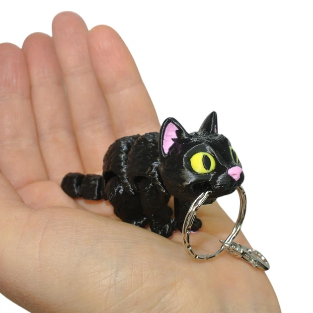 Кинематический 3D брелок Кот черный кот с желтыми глазами 2