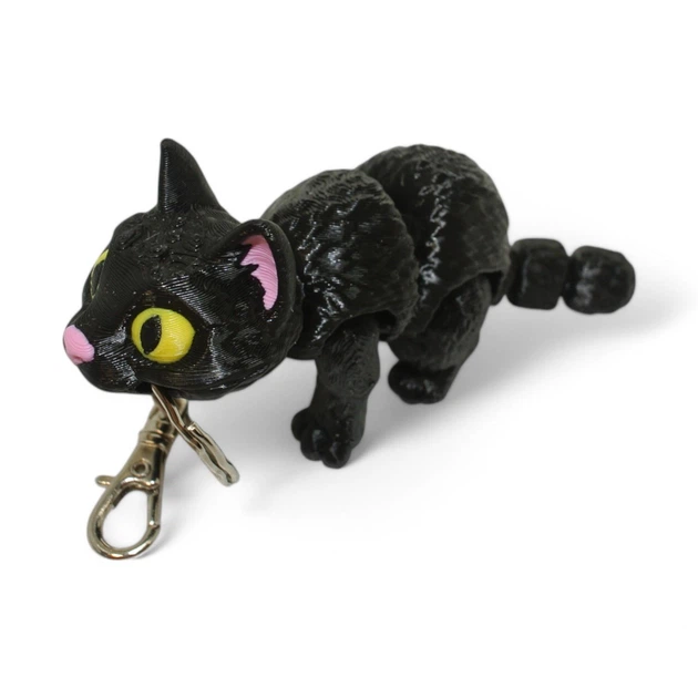 Кинематический 3D брелок Кот черный кот с желтыми глазами