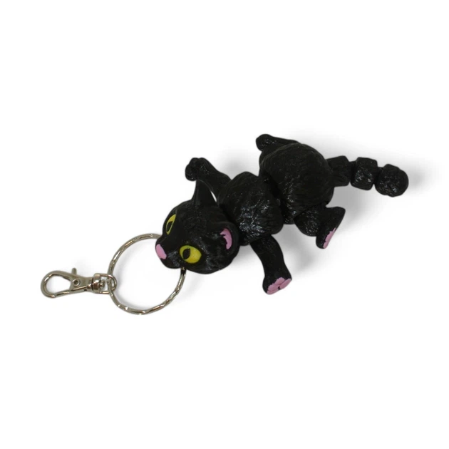 Кинематический 3D брелок Кот черный кот с желтыми глазами 1