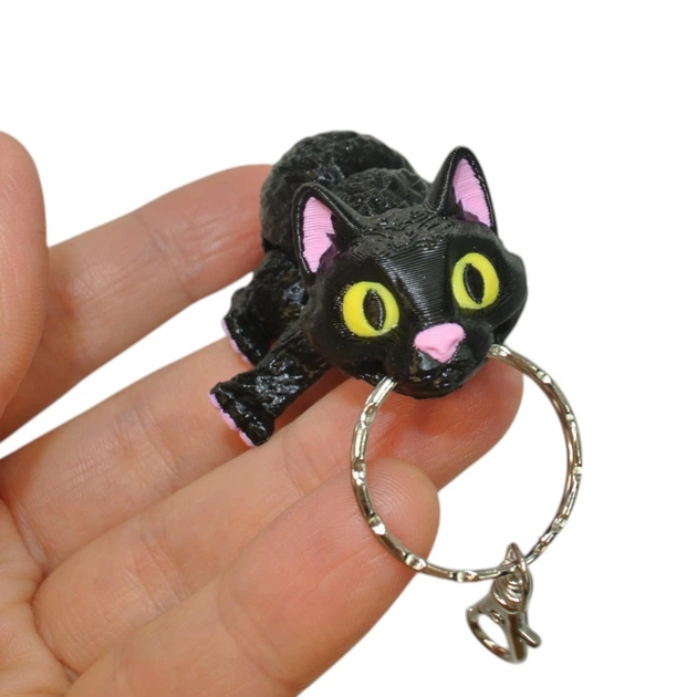 Кинематический 3D брелок Кот черный кот с желтыми глазами 3