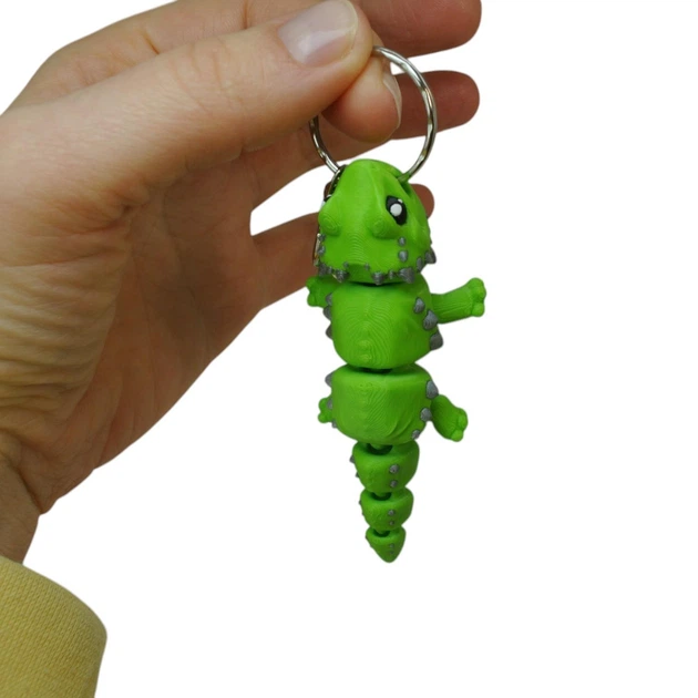 Кинематический 3D брелок Ящерица зеленая с серым 2